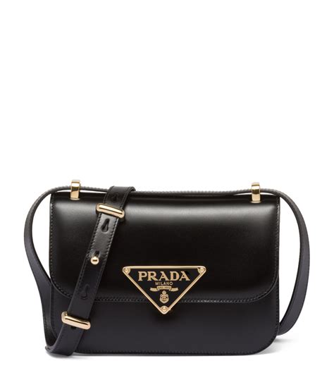 prada gromment crossbody bag|Prada crossbody bag.